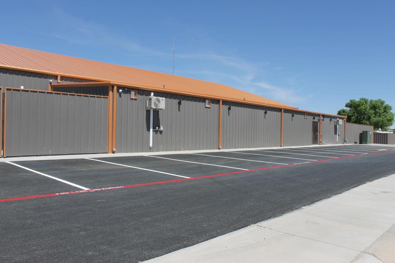 Employee parking lot section with fresh white striping