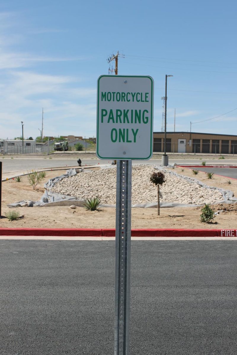 Motorcycle parking only sign installed at a commercial lot